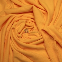 Трикотажная ткань Трёхнитка петля (золотистая, горчично-оранжевая)